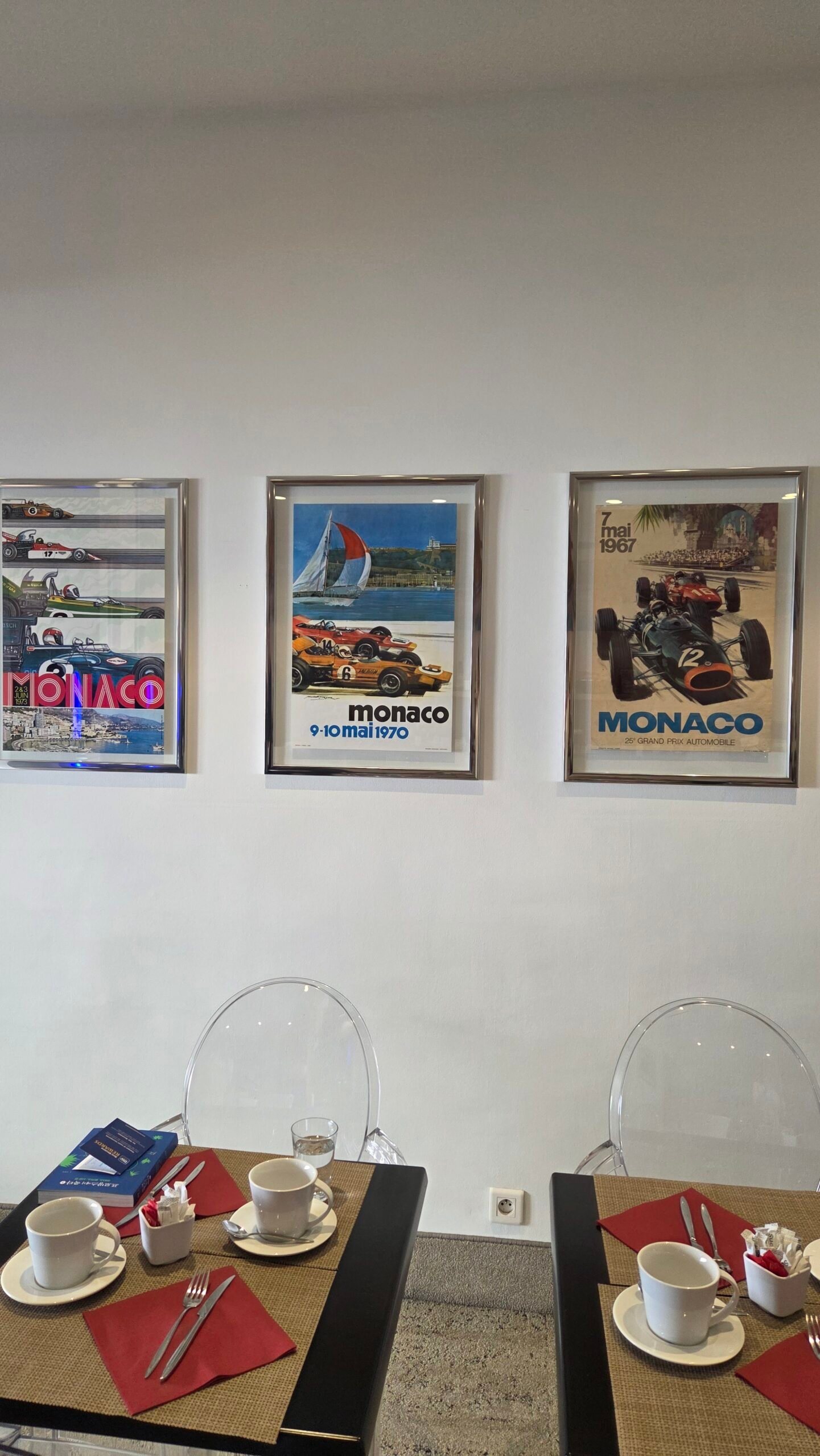 Breakfast room at Prince de Galles Menton decorated with vintage Monaco Grand Prix posters