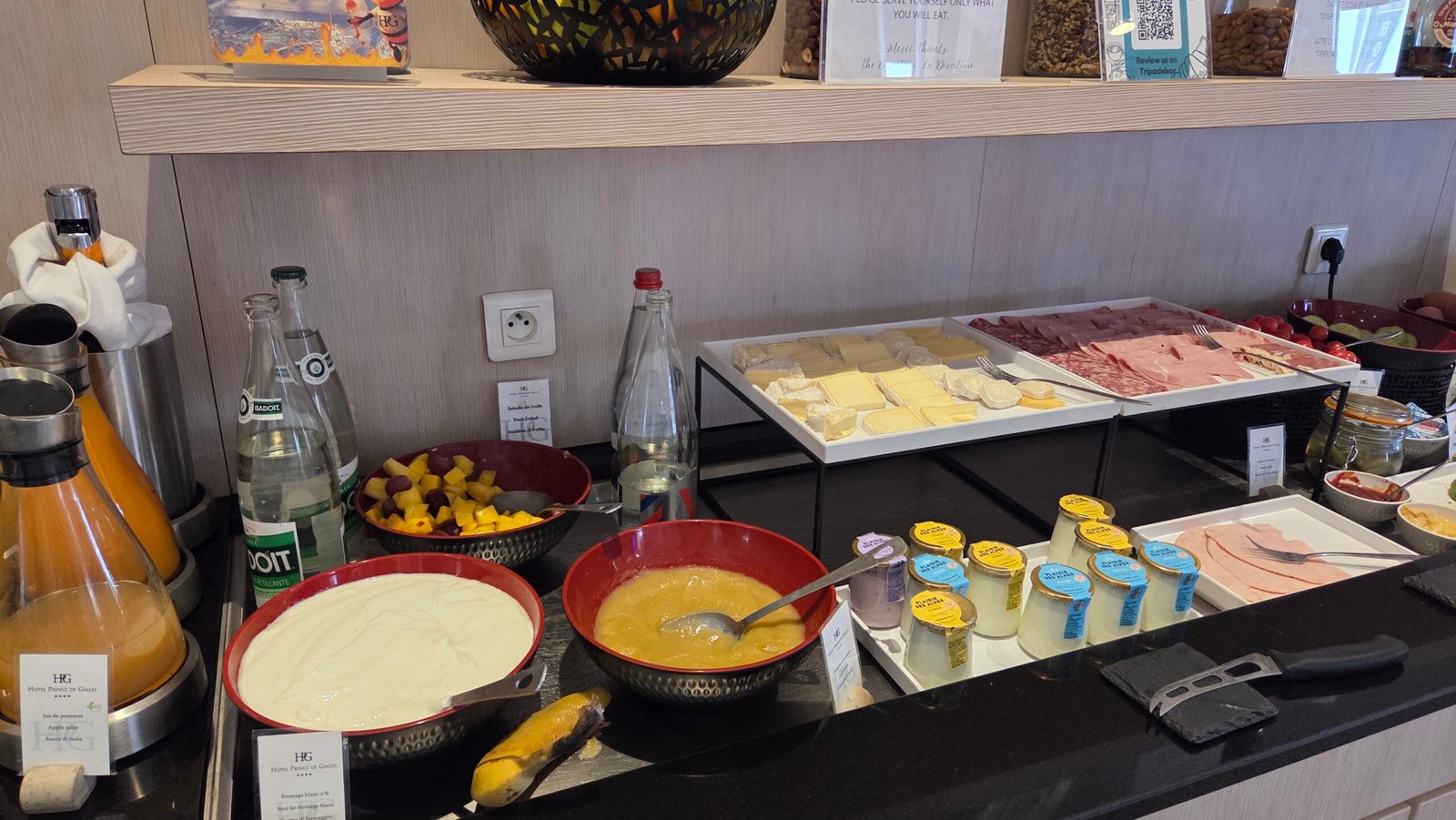Cheese, charcuterie, yogurt and fruit salad spread at the Prince de Galles Menton breakfast buffet