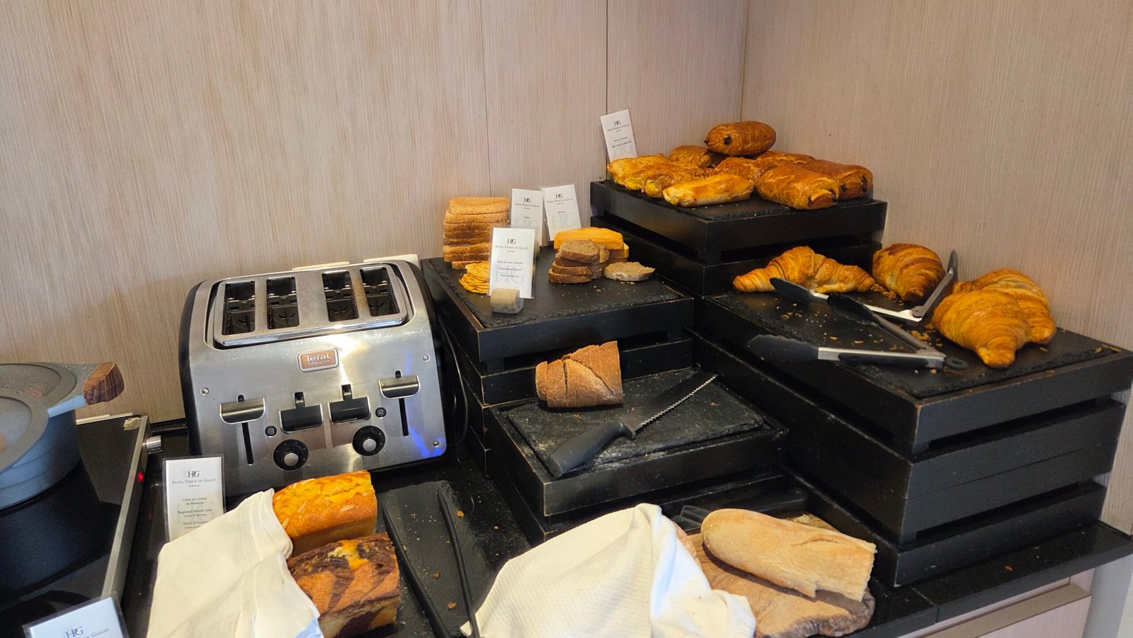 Continental breakfast buffet spread of croissants and pastries at Prince de Galles Menton