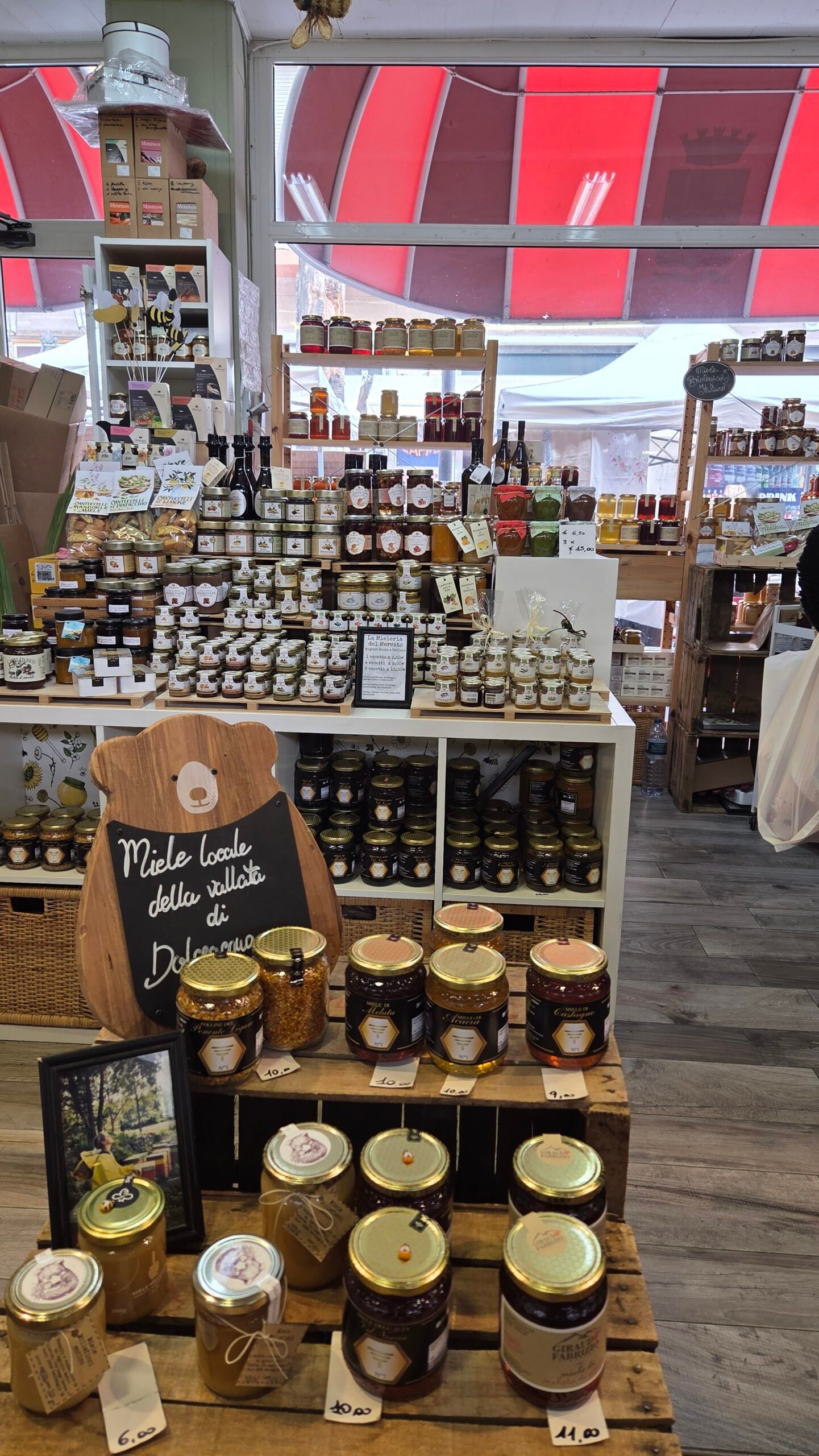 Honey stall display at Mercato Coperto market, Ventimiglia