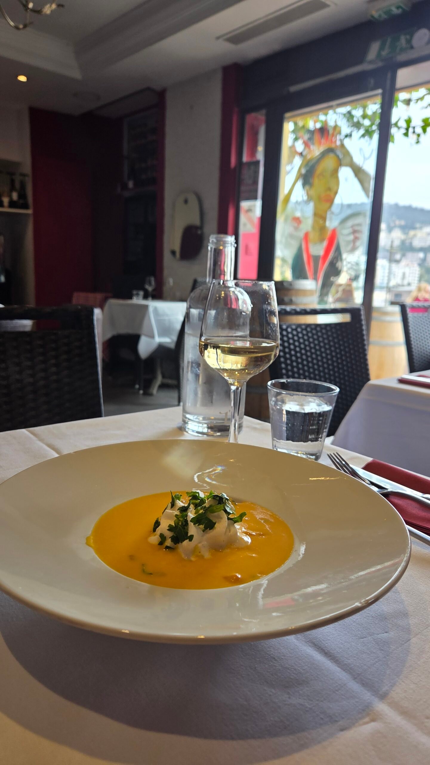 Pumpkin soup and a glass of white wine at HYDE bistro near Nice Port