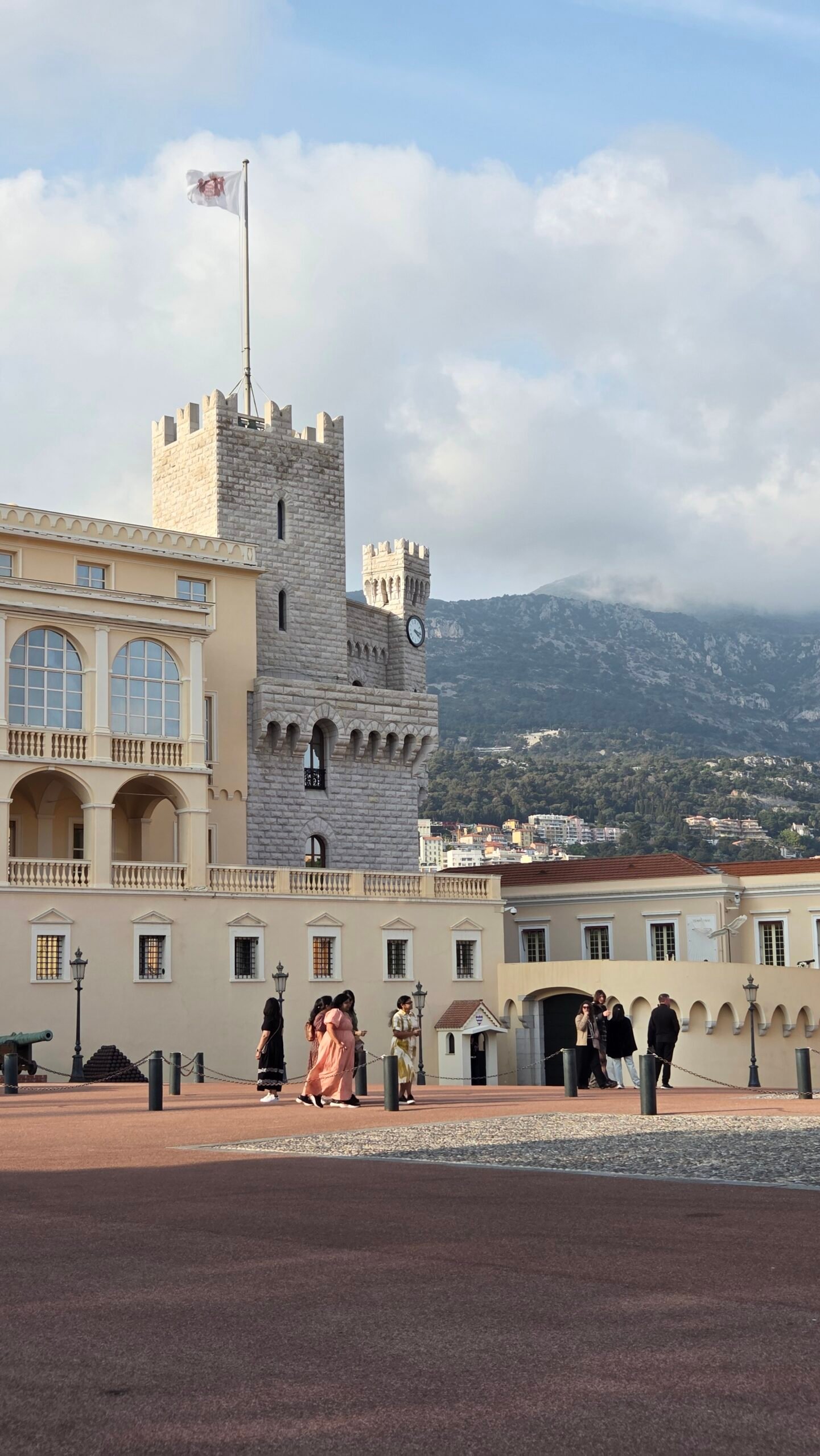 Tower and flag of the Prince's Palace courtyard in Monaco