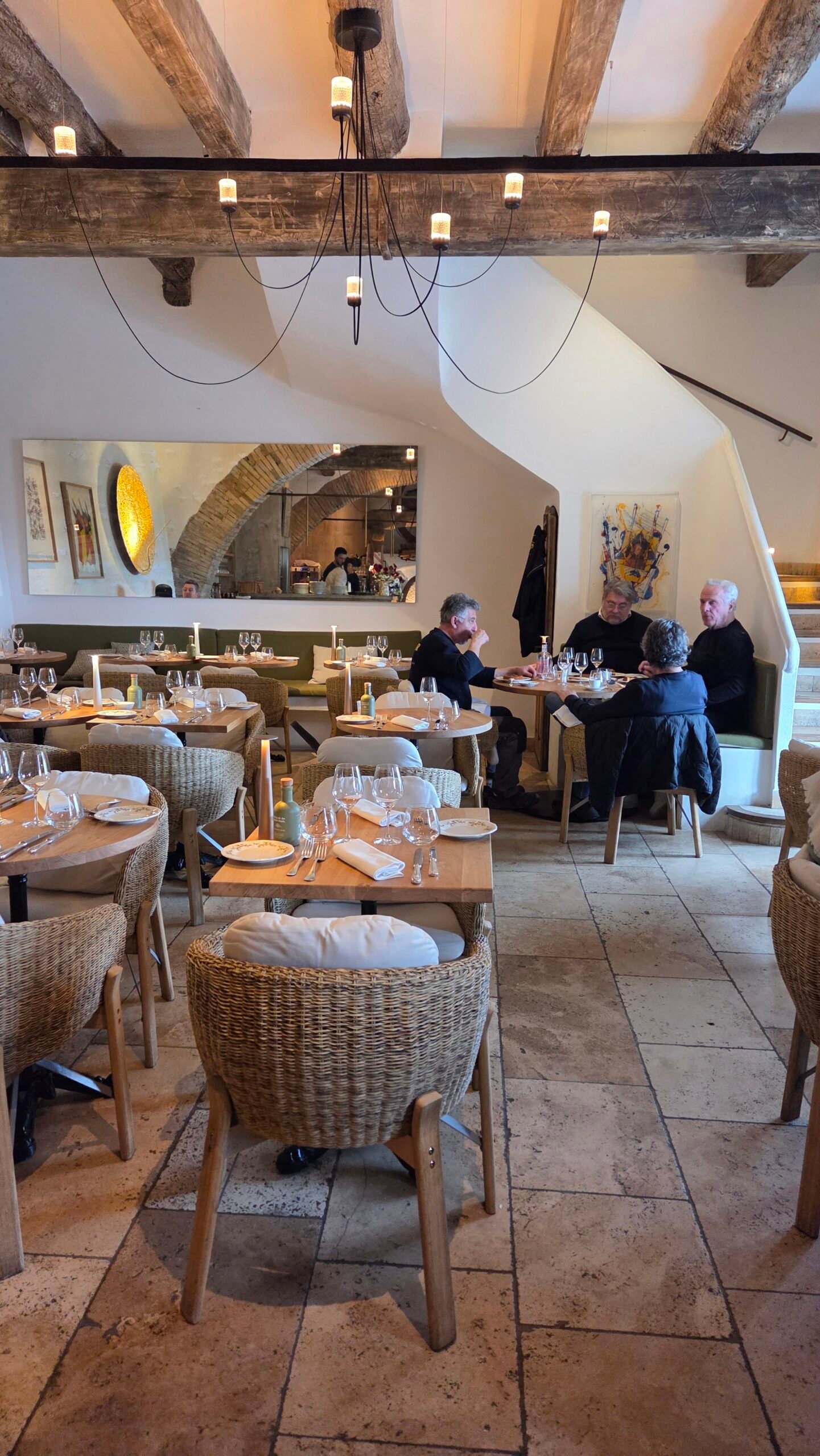 Interior of Le Moulin de Saint-Paul restaurant, a former 17th-century oil mill in Saint-Paul-de-Vence