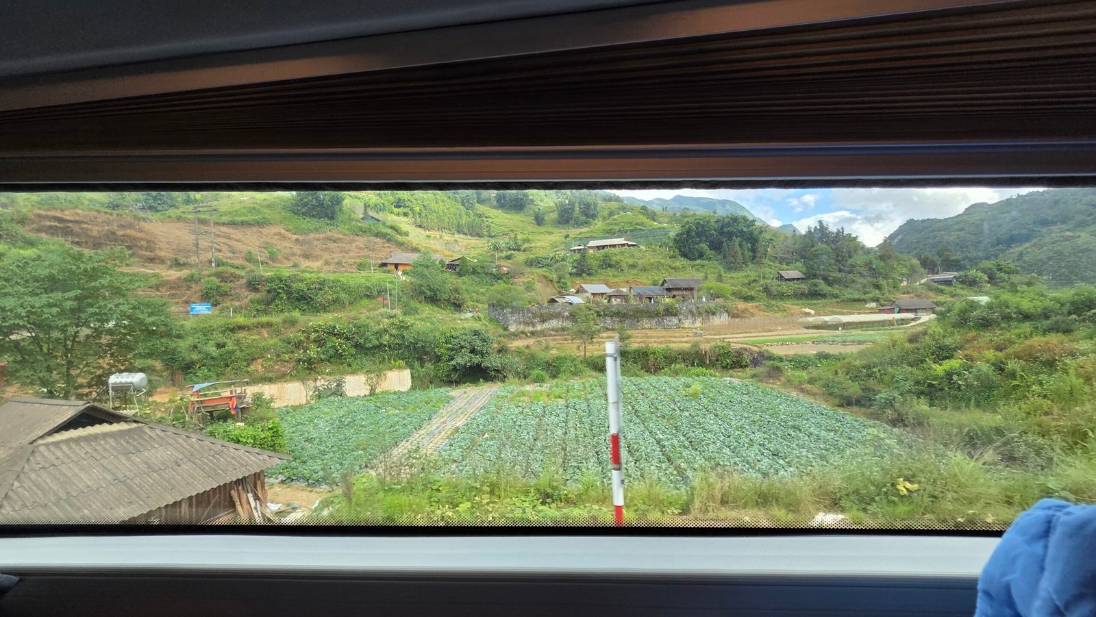 Sapa's mountain scenery through the sleeper bus window