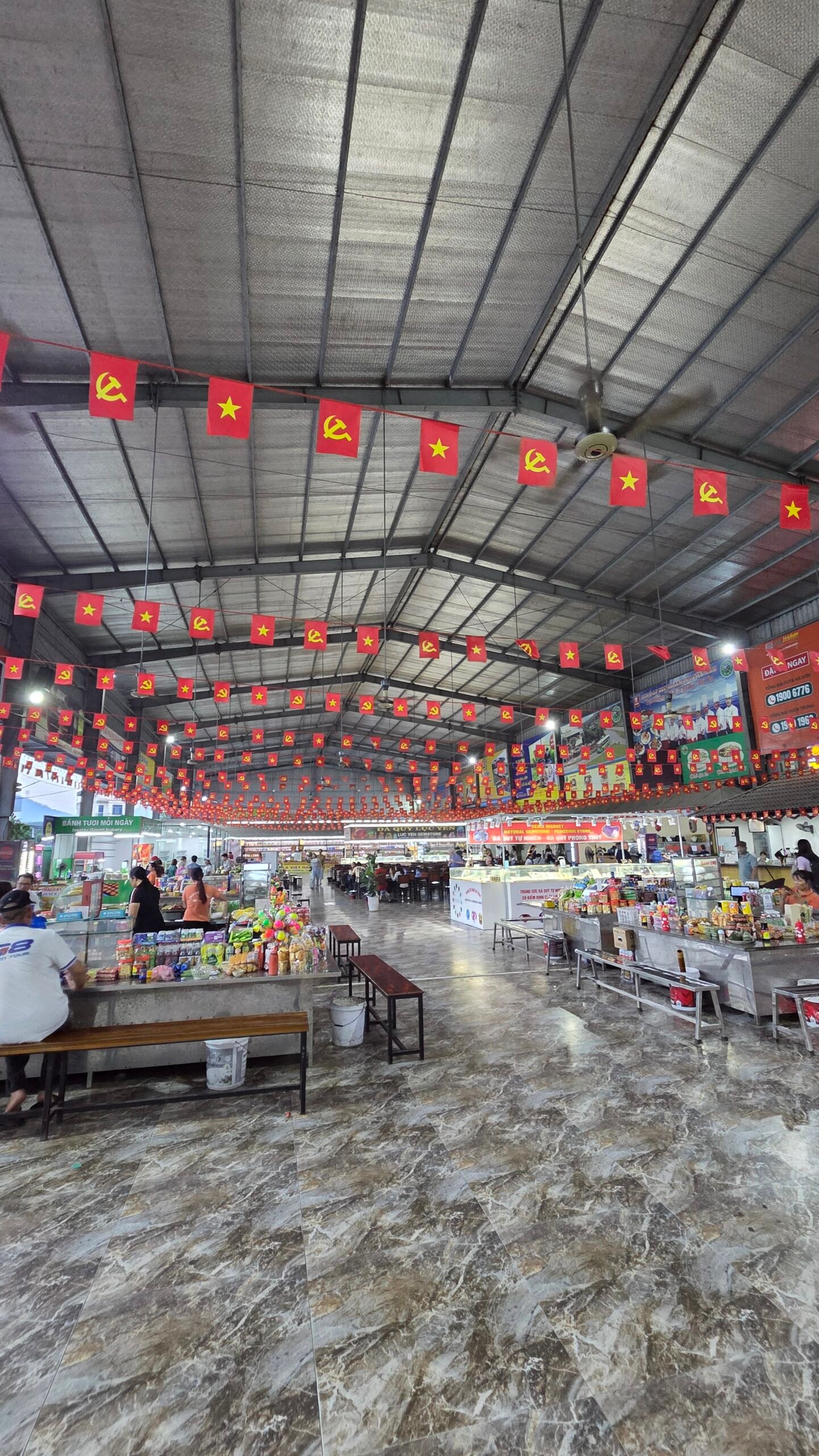Food stalls at a large rest stop during the G8 Open sleeper bus ride
